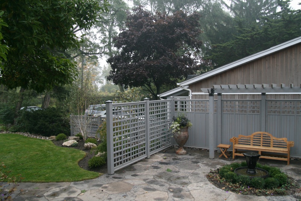 side courtyard garden, privacy screen, arbor, natural flagstone, urn, teak bench,fence